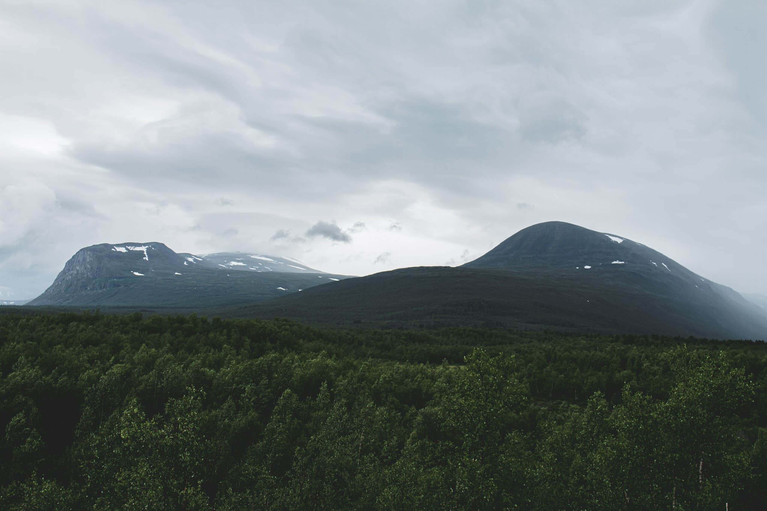 mountain landscape with clouds in kiruna, sweden